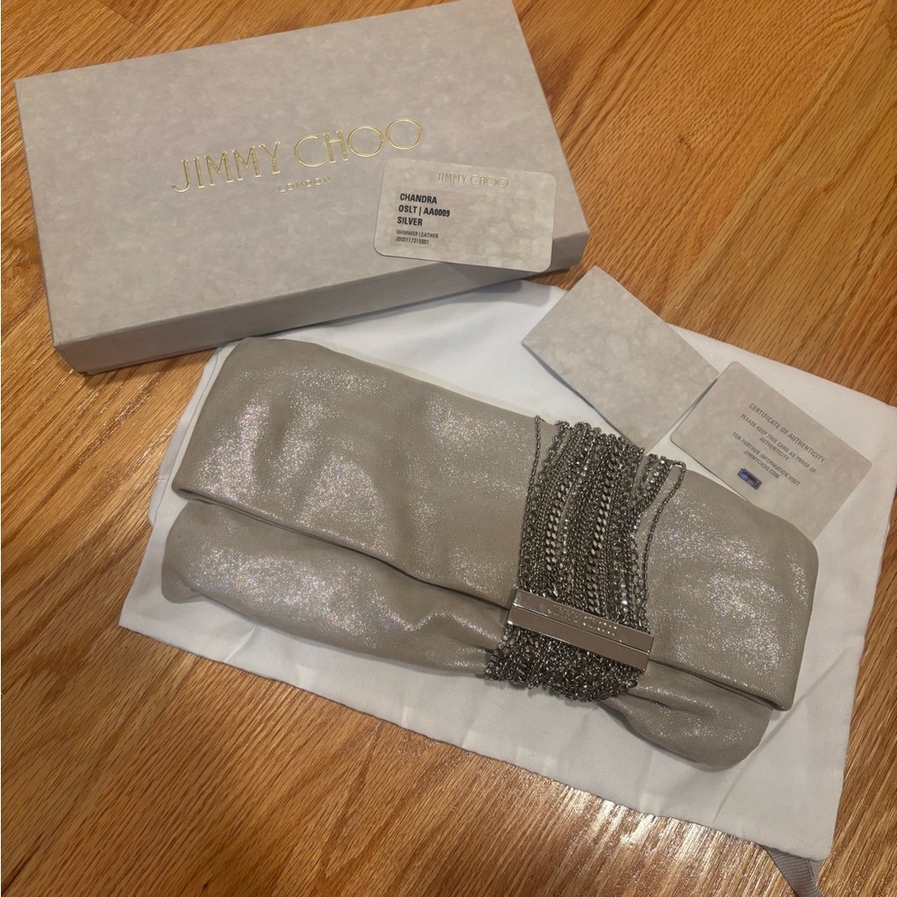 Jimmy Choo Metallic Silver Fold-Over Clutch with Chain Fringe